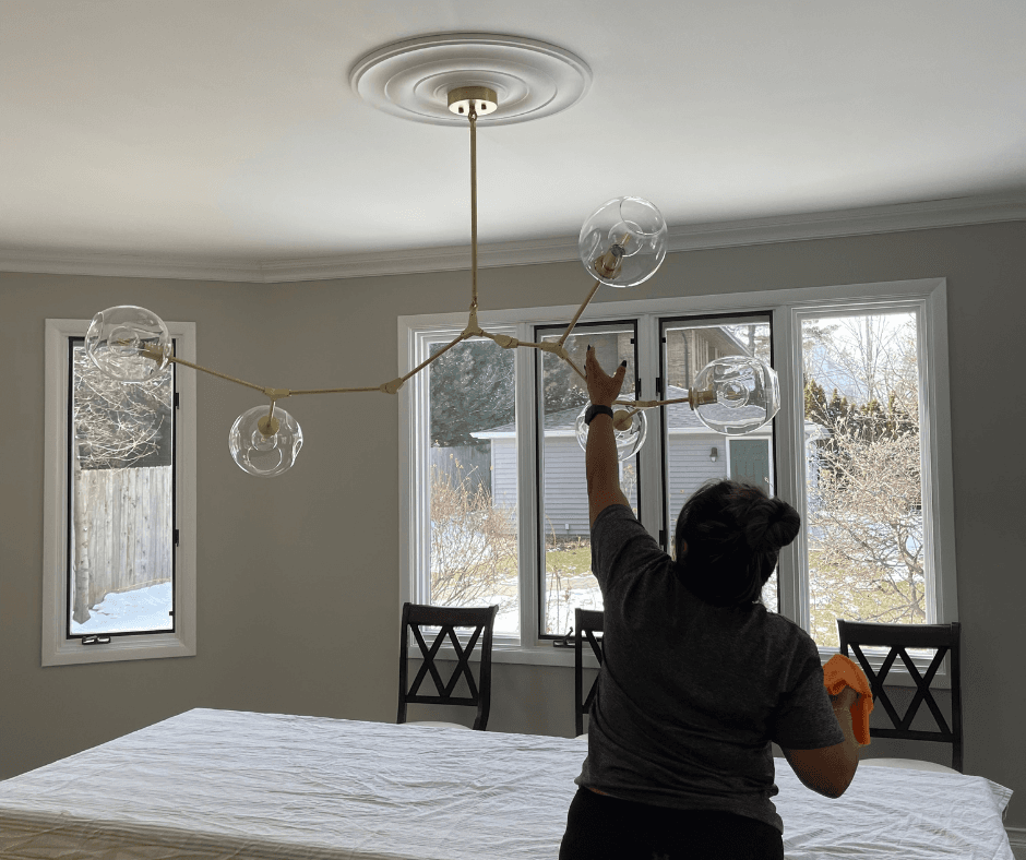 Professional cleaner at work in a southwest Chicago suburb home — DSM Cleaning Solutions