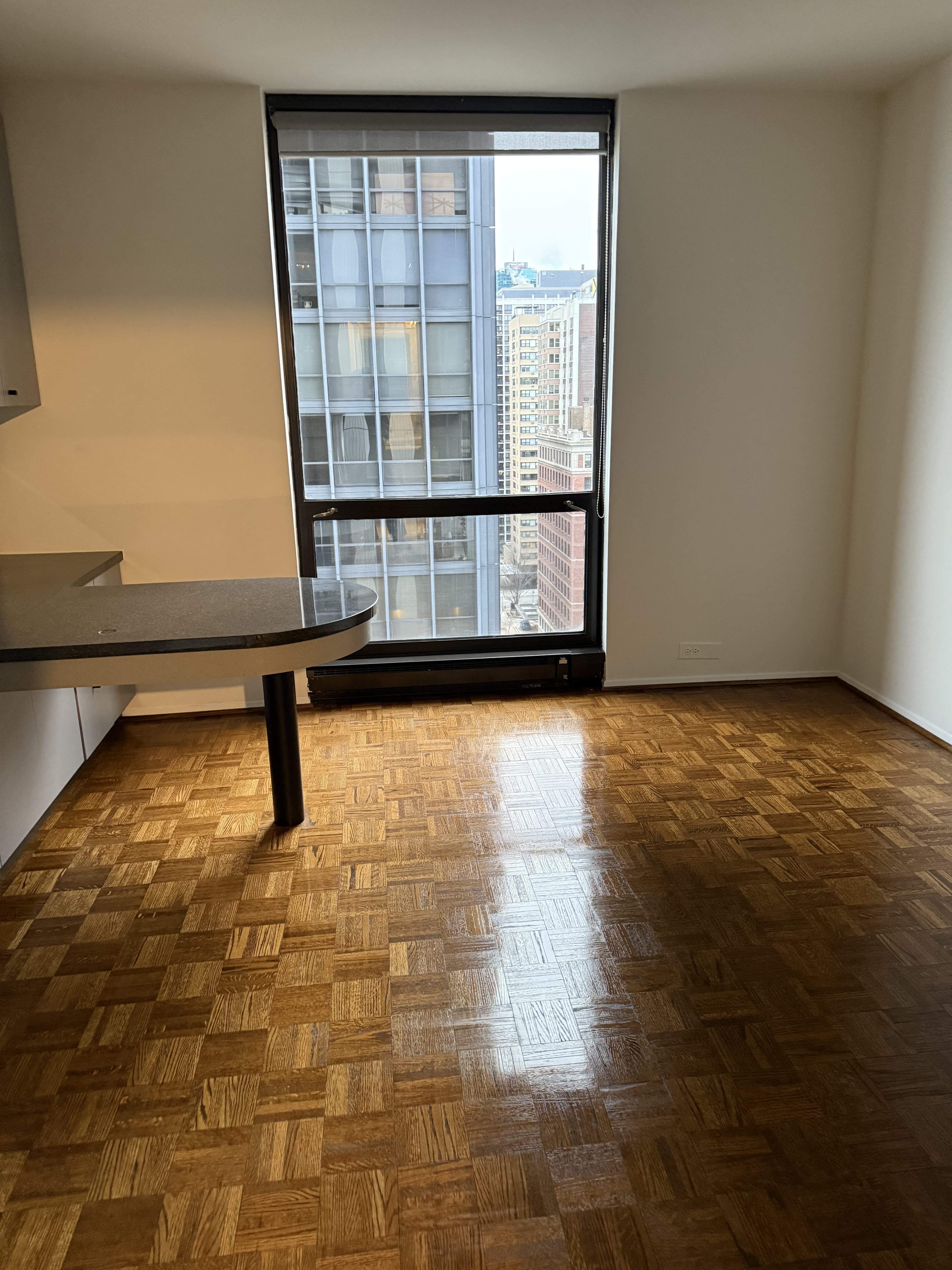 Clean apartment with parquet hardwood floors after professional cleaning service in Joliet IL