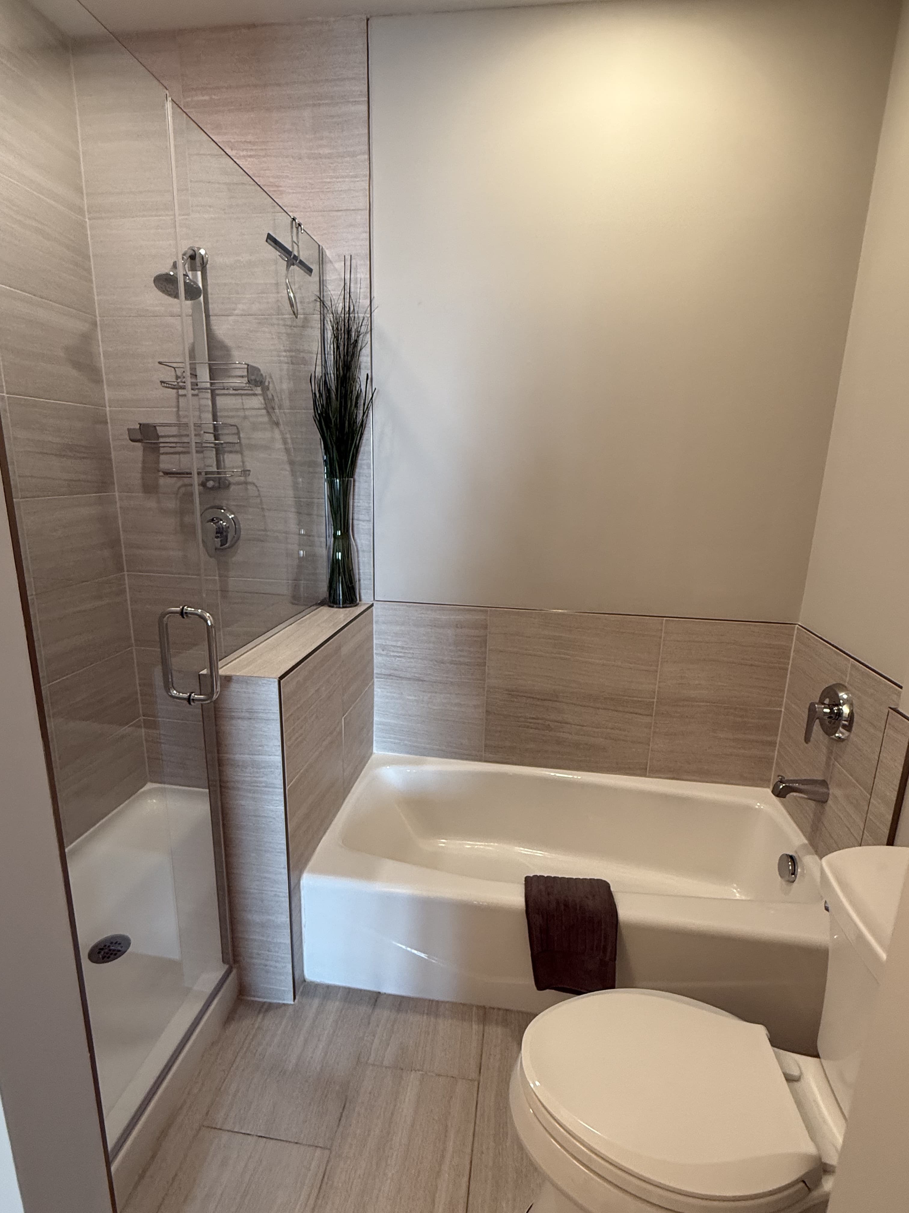 Full bathroom with walk-in shower and tub professionally deep cleaned in Plainfield IL