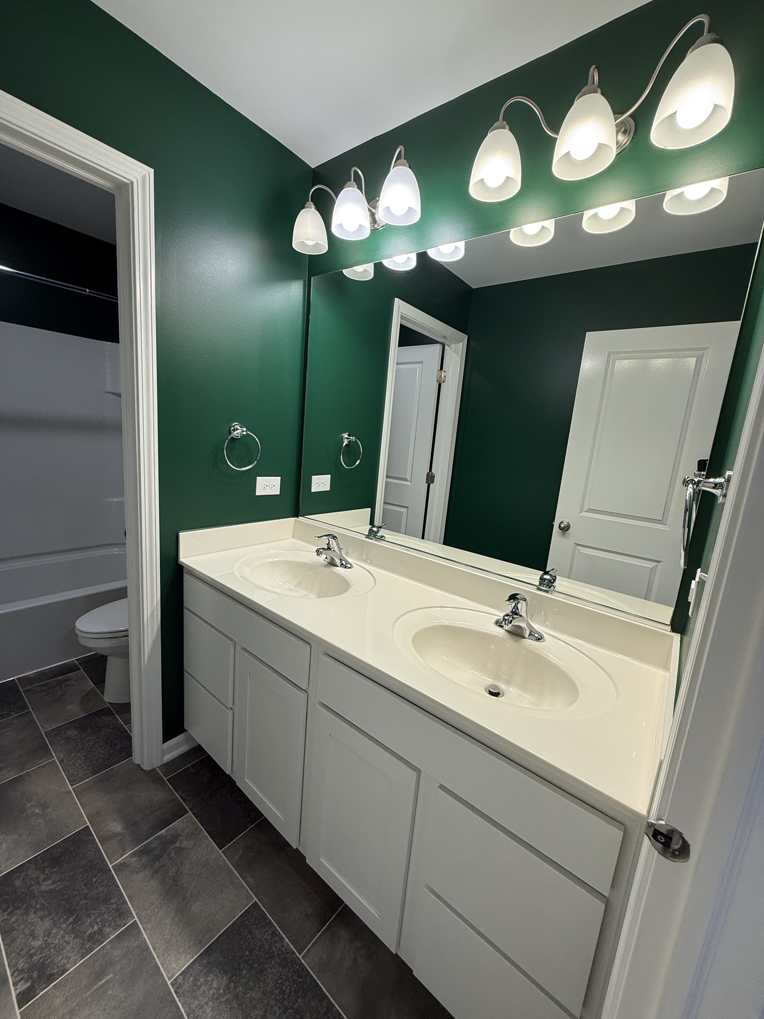 Double sink bathroom deep cleaned and sanitized by DSM Cleaning Solutions in Plainfield IL