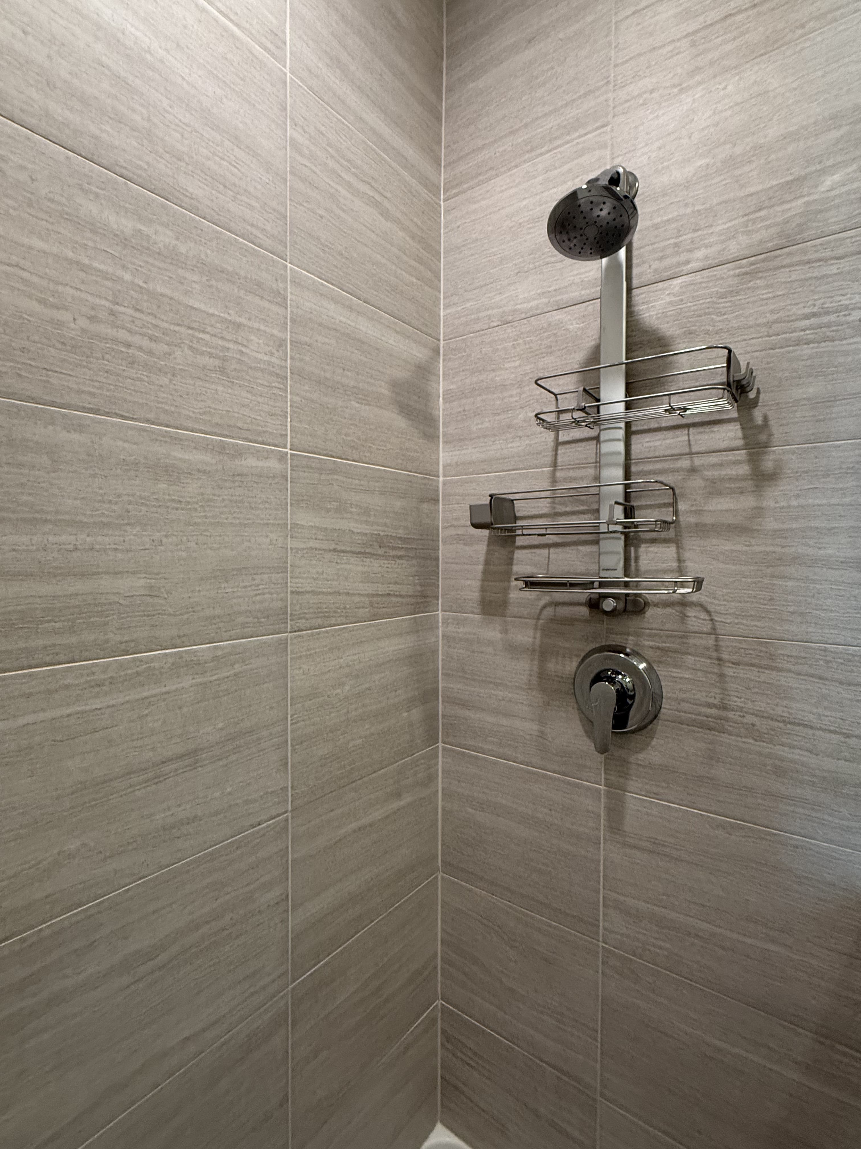 Spotless shower tile cleaned by DSM Cleaning Solutions in Romeoville IL