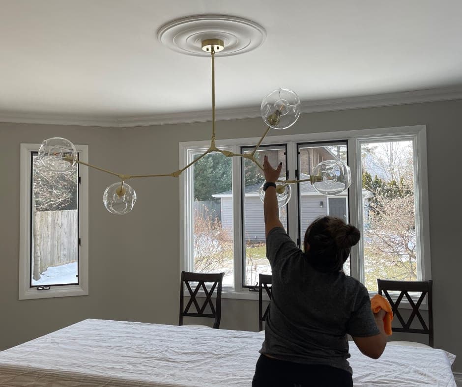 DSM Cleaning Solutions professional cleaner at work in a Plainfield IL home